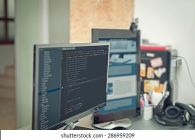 web site codes on computer monitor ar office - Powered by Shutterstock