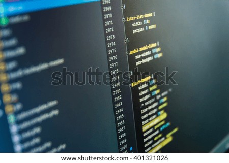 Web site codes on computer monitor. Computer program. Developer working on program codes in office. Programming code. Computer script.  Programmer developer screen. 
