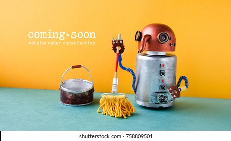 Web site under construction Coming Soon template page. Robot washer with mop and bucket of water, orange wall green floor interior.