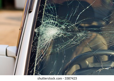 web of splits on the triplex windscreen