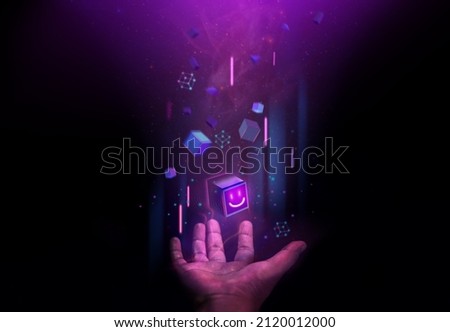 Web3, Blockchain Technology Concepts. Hand Levitating a Digital Smiling Box Icon and many Futuristic Graphic to Connecting the Universe. Space Elements from Nasa