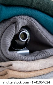 Webcam Hidden In A Stack Of Clothes For Covert Surveillance Of The House. Surveillance And Security Systems. Smart House. Espionage. Hidden Camera For Watching