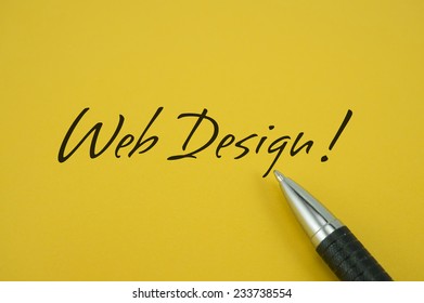 WebDesign! note with pen on yellow background