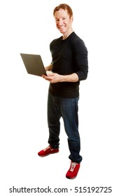 Webdesigner holding a computer and smiling content