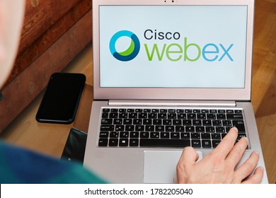 Webex Meetings Is Used For Business Meeting On Laptop By Man. An Illustrative Editorial Image. San Francisco, US, June 2020.