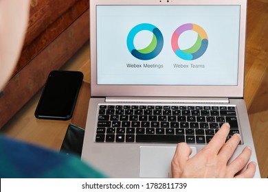 Webex Meetings Is Used For Business Meeting On Laptop By Man. An Illustrative Editorial Image. San Francisco, US, June 2020.