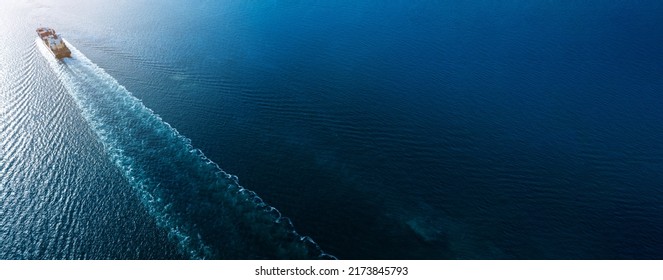 webinar banner, Aerial top view of cargo maritime ship with contrail in the ocean ship carrying container and running for export concept technology freight shipping by ship smart service  forwarder  - Shutterstock ID 2173845793