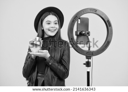 weblog and vlog. makeup tutorial. influencer. happy teen girl use selfie led. kid beauty blogger.