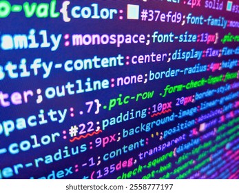 Website concept in blue virtual space. Developer work. Remote work search. White lines of code over purple background. Computer source code in blue. Virus in program code. Binary code.