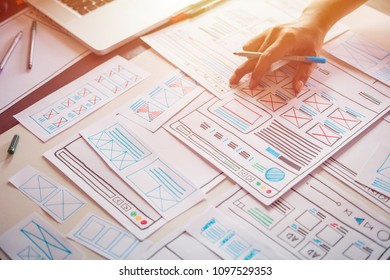 Website designer Creative planning application development  draft sketch drawing template layout framework wireframe design studio . User experience concept .