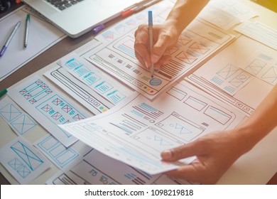 Website designer Creative planning application development  draft sketch drawing template layout framework wireframe design studio . User experience concept .