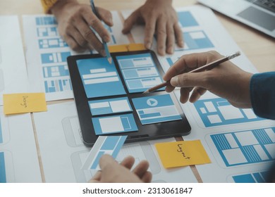 Website designer Creative planning application development draft sketch drawing template layout framework wireframe design studio . User experience concept .