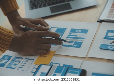Website designer Creative planning application development draft sketch drawing template layout framework wireframe design studio . User experience concept .