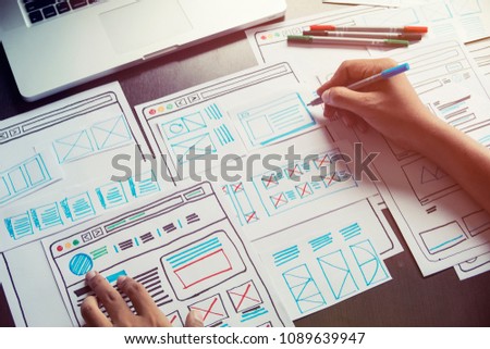 Website designer Creative planning application development  draft sketch drawing template layout framework wireframe design studio . User experience concept .