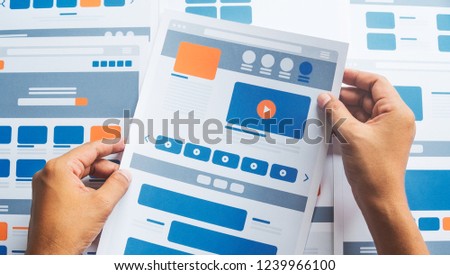 Website designer Creative planning application developer development draft sketch drawing template layout prototype framework wireframe design studio . User experience concept .