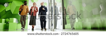 Website header shot of multiethnic group of young adults walking together in modern building, engaging in conversation, holding coffee cups, reflecting in glass wall, urban cityscape visible outside