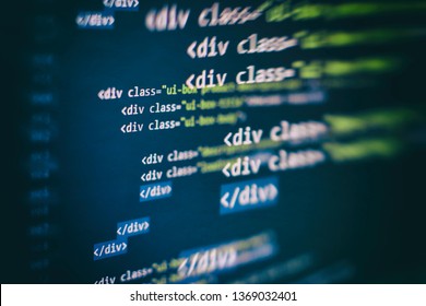 Website HTML Code on the Laptop Display Closeup Photo. Desktop PC monitor photo.