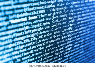 Website HTML Code on the Laptop Display Closeup Photo. Abstract IT technology background.  Internet security hacker prevention. Desktop PC monitor photo. Big data database app. 
