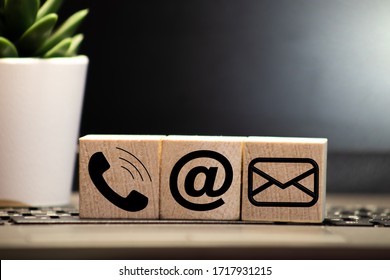 Website and Internet contact us page concept with black icons - Shutterstock ID 1717931215