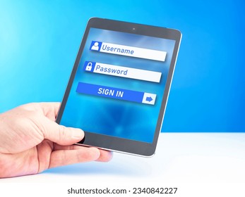 Website login form. Electronic tablet in hand. Place to enter username and password. Internet authorization. Need to enter password for identification. Digital security. Authorization in application - Shutterstock ID 2340842227
