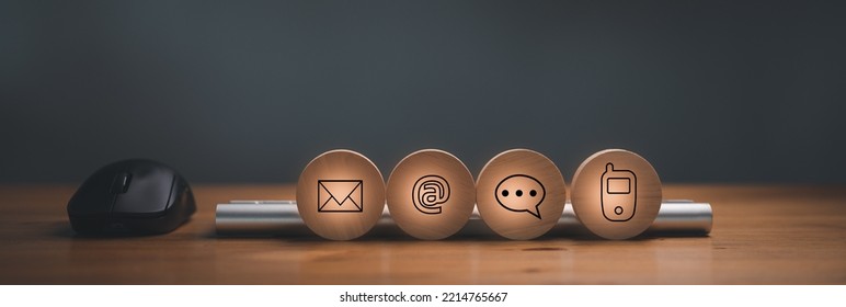 Website Page Contact Us Or E-mail Marketing Concept, Customer Support Hotline Contact Us People Connection. Label Wood With The Email, Call Phone, Address, Chat Message Icons.
