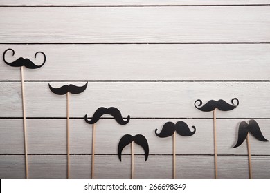 Wedding accessories set mustache on white table