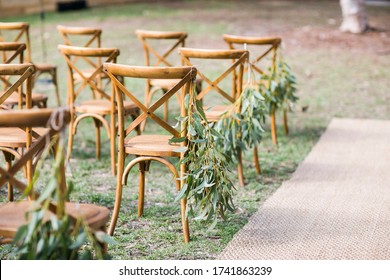 Wedding Aisle With Jute Runner, Wooden Chairs And Eucalyptus Leaves As Aisle Decorations- Natural, Rustic Wedding Decor