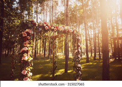 Wedding Arch Decorated With Flowers. Vintage Picture