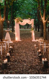 Wedding Arch In The Forest With Light Bulbs