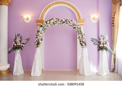 Wedding arch in pink interior