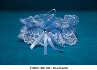 Wedding Background With Blue Bridal Garter