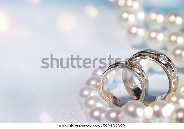 Wedding Background Rings Pearls Stock Photo (Edit Now) 592182359