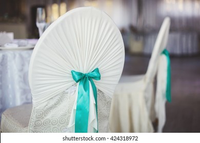 Wedding Banquet in the restaurant, the Tiffany color. Table. Chair. Arch. Tent. Tinsel.
