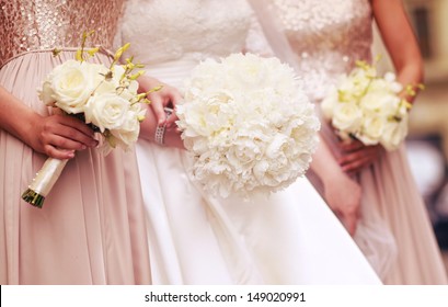 Wedding bouquet of a bride and two bridesmaid