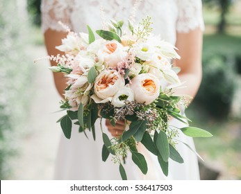 wedding bouquet in bride's hands, david austin  - Shutterstock ID 536417503