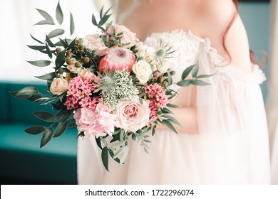 Wedding Bouquet In The Hands Of The Bride