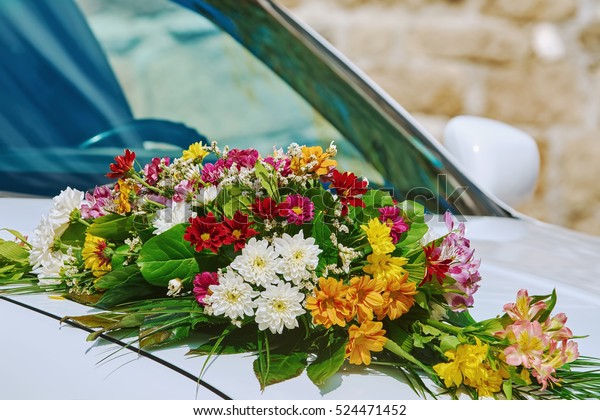 Wedding Bouquet on the Car\
Bonnet