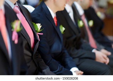 Wedding boutonniere on suit jacket of groom's man