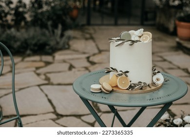 wedding cake, bride and groom cutting the cake, tuscan luxury boho rustic style wedding decor - Powered by Shutterstock