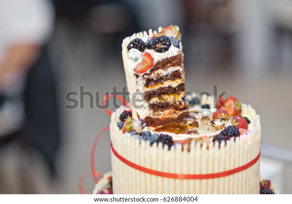 Wedding cake is divided into\
shares.