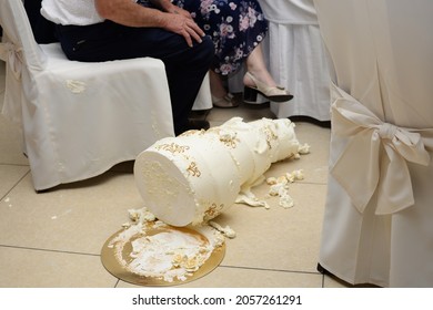 The Wedding Cake Fell To The Floor. White Cake Dropped On The Floor