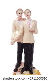 
Wedding Cake Figurine Of A Gay Male Couple For Wedding On White Studio Isolated Background