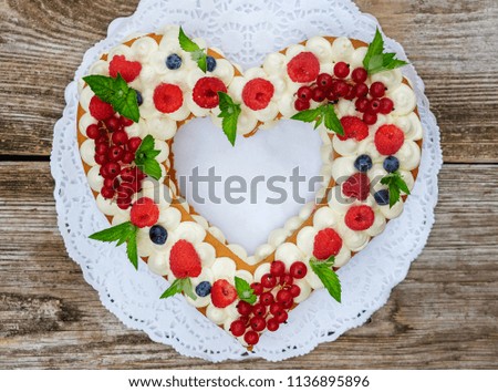 Similar – Strawberry tartlet in heart shape