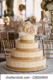 Wedding Cake With Roses At Luxury Reception