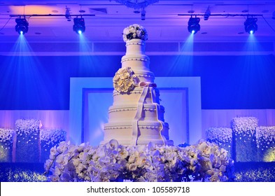 Wedding Cake With Stage Lighting In Wedding Ceremony