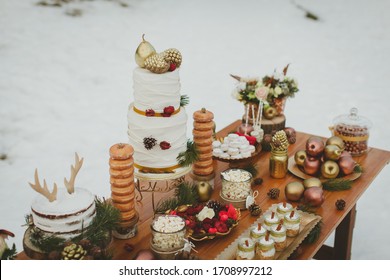 Wedding Candy Table. Wedding Winter Cake In The Snow. Close Up.