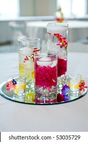 Wedding Centerpiece With Floating Candles And Flowers