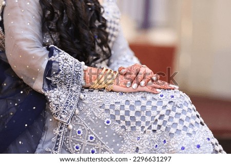 Wedding Ceremony. Bride Hands And Ring And Banlge and clutch and flower Photos. Adnan Photographer.