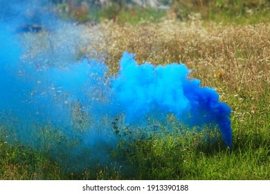 Wedding Colored Smoke Bomb On The Grass