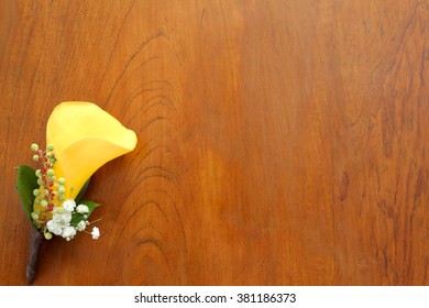 Wedding Corsage On The Wooden Table As The Background